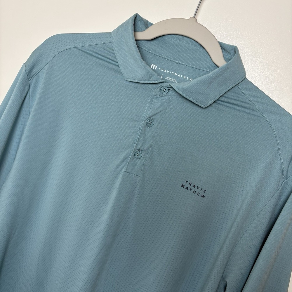 TravisMathew Mens L Blue Golf Polo Shirt Short Sleeve Performance Block Logo